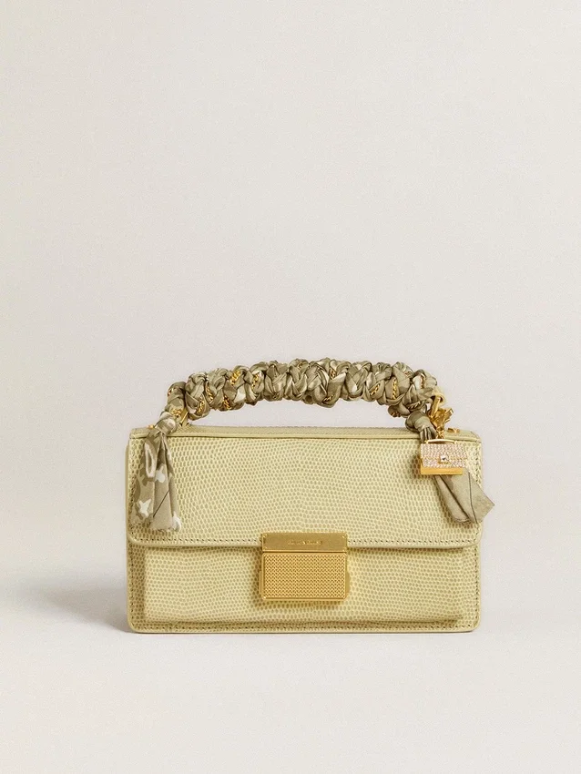 Ciondolo a forma di borsetta in ottone color oro con cristalli