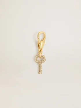 Ciondolo a forma di chiave in ottone color oro con cristalli