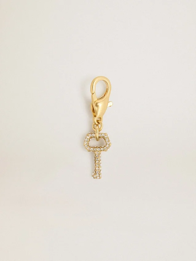 Ciondolo a forma di chiave in ottone color oro con cristalli