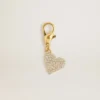 Ciondolo a forma di cuore in ottone color oro con cristalli