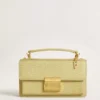 Ciondolo a forma di lettera F in ottone color oro con cristalli
