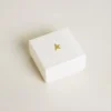 Ciondolo a forma di lettera T in ottone color oro con cristalli
