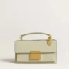 Ciondolo a forma di lettera T in ottone color oro con cristalli
