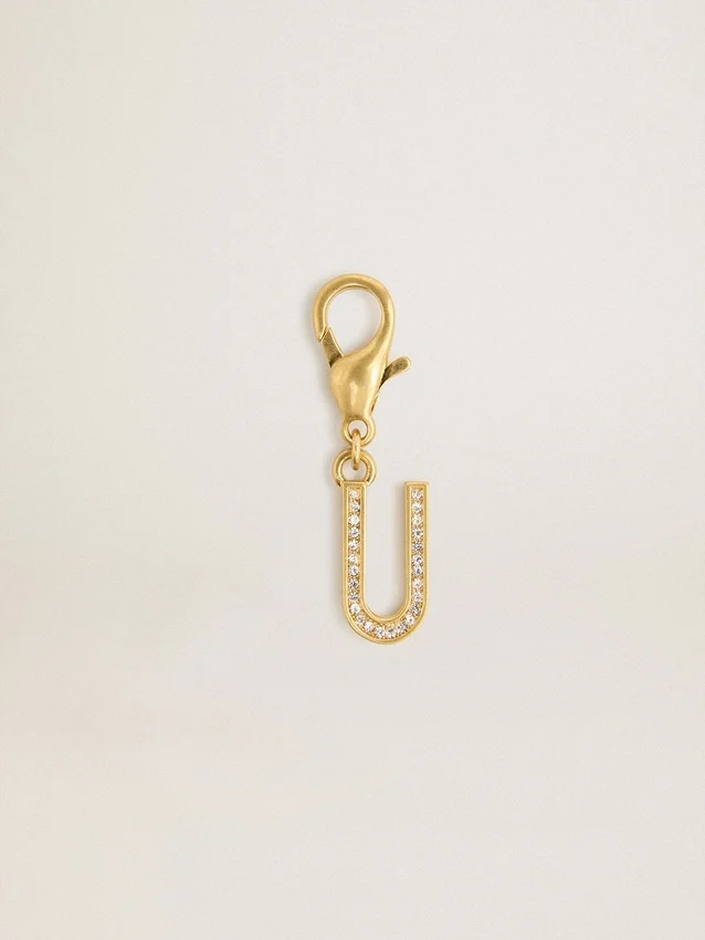 Ciondolo a forma di lettera U in ottone color oro con cristalli