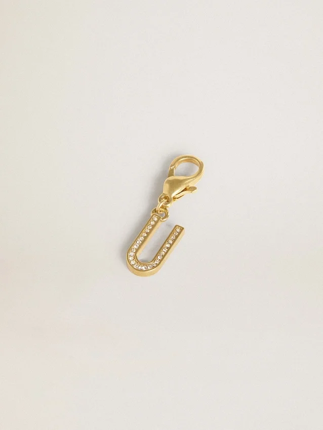 Ciondolo a forma di lettera U in ottone color oro con cristalli