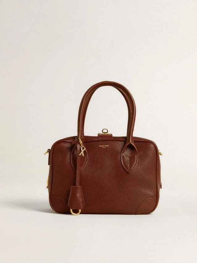 Ciondolo a forma di lettera X in ottone dorato con cristalli