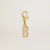 Ciondolo con la lettera B in ottone color oro con cristalli