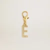 Ciondolo con la lettera E in ottone color oro con cristalli