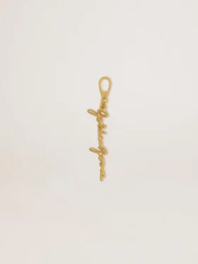Ciondolo in ottone color oro con firma golden goose