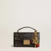Ciondolo in ottone color oro con firma golden goose
