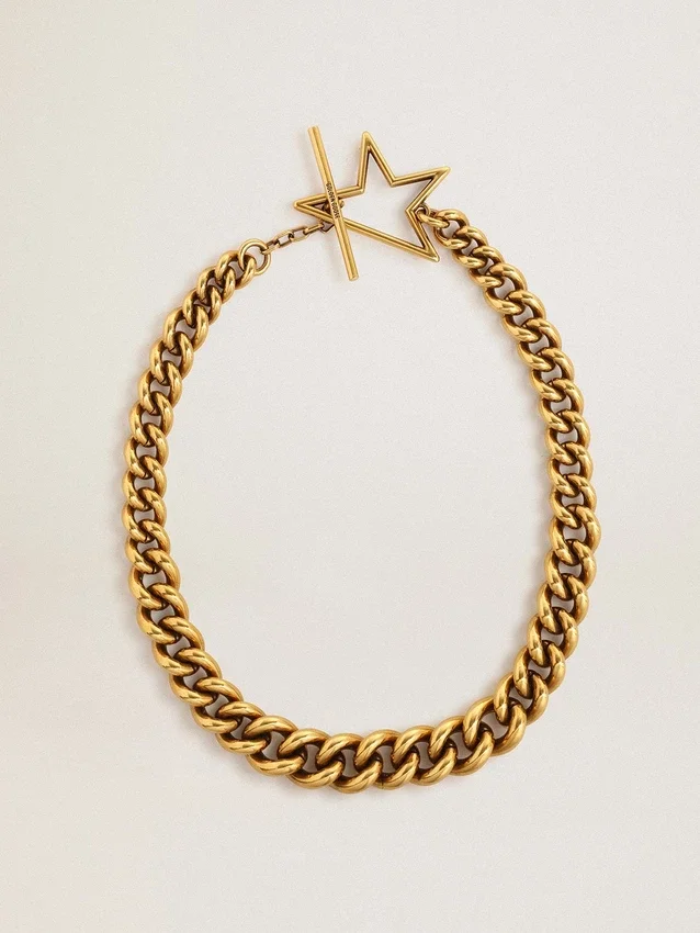 Collana con catena a maglie decrescenti color oro antico e chiusura a forma di stella