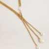 Collana con catene color oro antico e perle