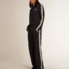Felpa blu scuro con zip, striscia bianca e stelle a contrasto