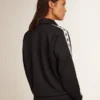 Felpa blu scuro con zip, striscia bianca e stelle a contrasto