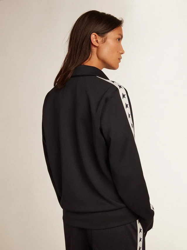 Felpa blu scuro con zip, striscia bianca e stelle a contrasto