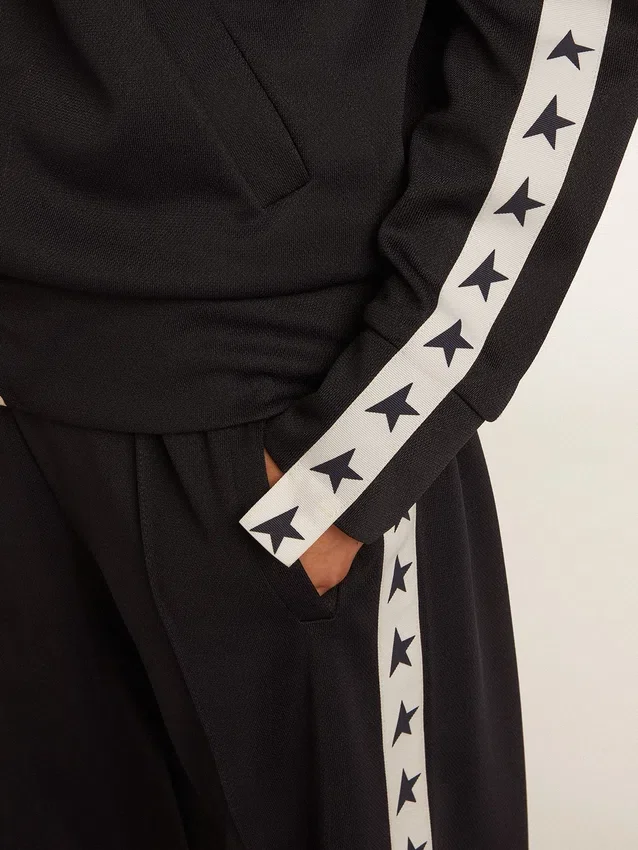 Felpa blu scuro con zip, striscia bianca e stelle a contrasto