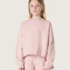 Felpa corta da bambina “Star” in cotone rosa con toppa e logo