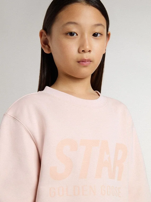 Felpa da bambina di colore rosa con scritta rosa sul davanti