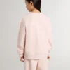 Felpa da bambina di colore rosa con scritta rosa sul davanti