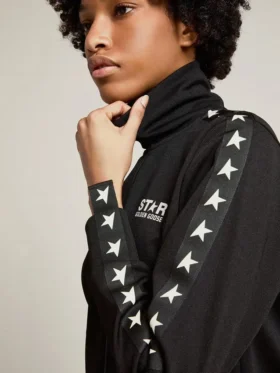 Felpa da donna nera con zip e stelle bianche