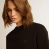 Felpa nera della Star Collection con stella tono su tono sul davanti