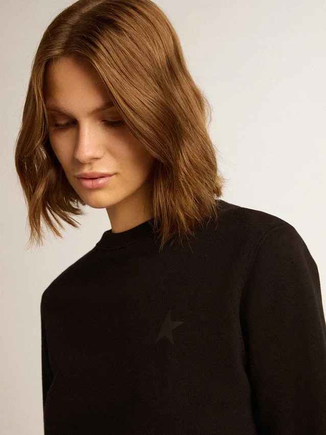 Felpa nera della Star Collection con stella tono su tono sul davanti
