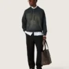 Felpa unisex con cappuccio in cotone nero con effetto sbiancato