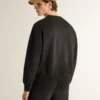 Felpa unisex in cotone nero effetto consumato con logo ricamato