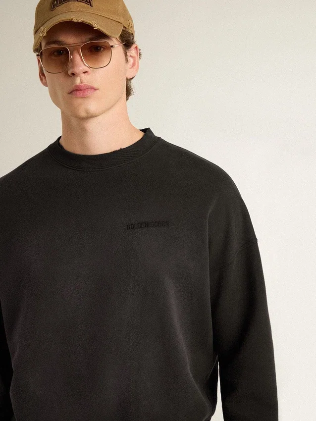 Felpa unisex in cotone nero effetto consumato con logo ricamato