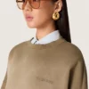 Felpa unisex in cotone verde militare effetto sbiancato con logo ricamato