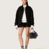 Minigonna da donna in twill di cotone nero con ricamo floreale in paillettes