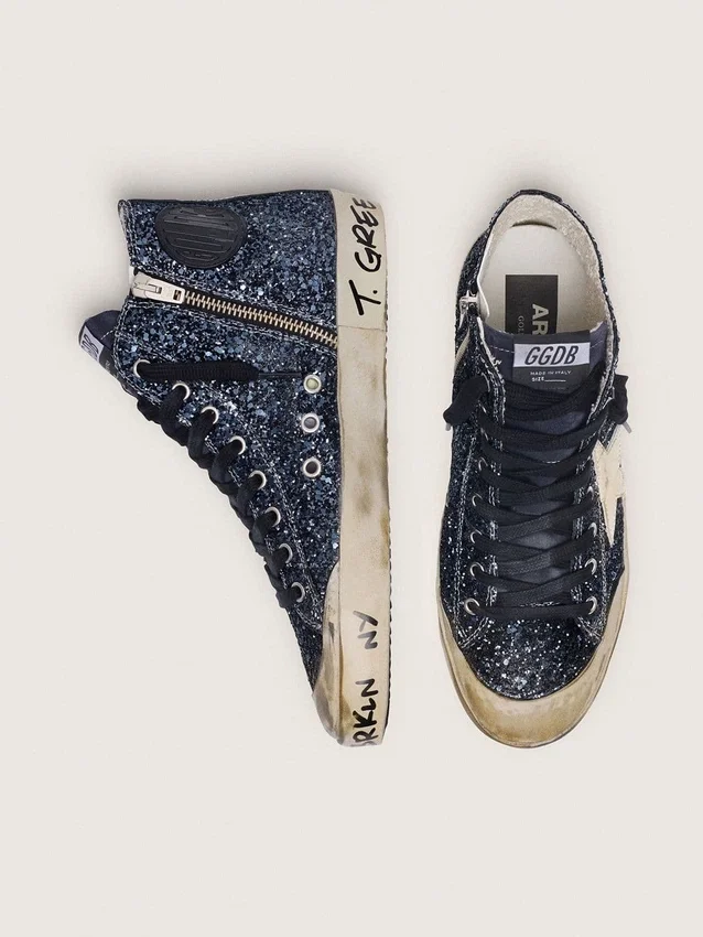 Francy da donna in glitter blu scuro con stella bianca