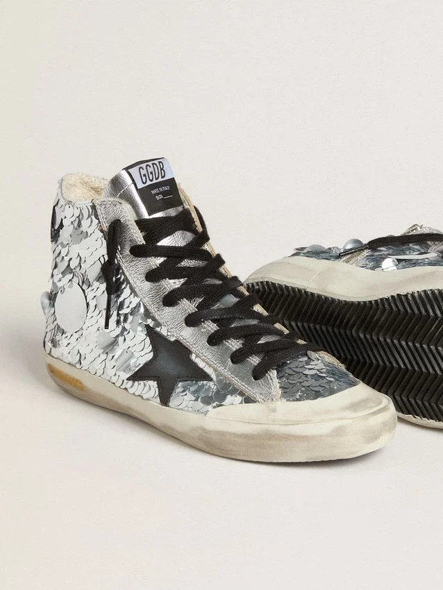 Francy da donna in nylon con paillettes argentate su tutta la superficie e stella in pelle nera