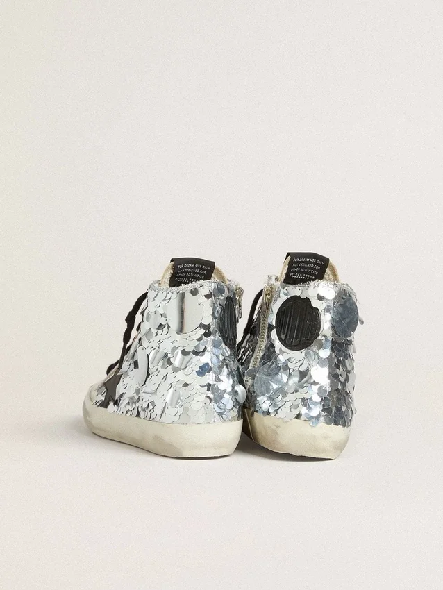 Francy da donna in nylon con paillettes argentate su tutta la superficie e stella in pelle nera