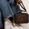 Francy da donna in pelle con stella in pelle scamosciata