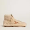 Francy da donna in shearling beige con stella in pelle marrone