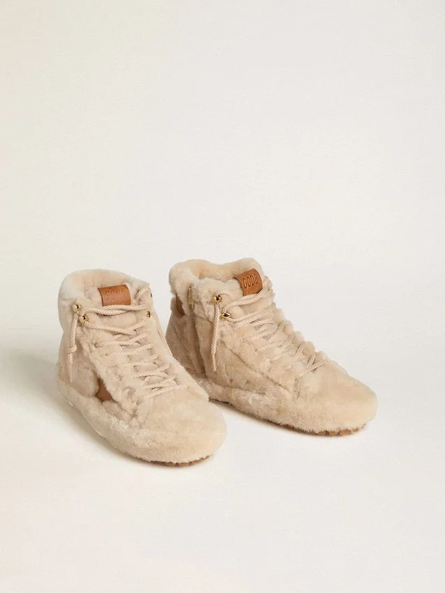 Francy da donna in shearling beige con stella in pelle marrone