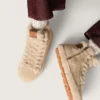 Francy da donna in shearling beige con stella in pelle marrone