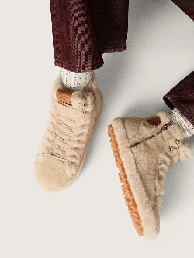 Francy da donna in shearling beige con stella in pelle marrone