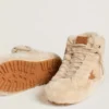 Francy da donna in shearling beige con stella in pelle marrone