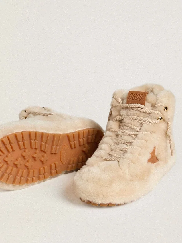 Francy da donna in shearling beige con stella in pelle marrone