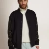 Giacca bomber da uomo in lana blu scuro con maniche in pelle
