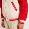 Giacca bomber in cotone bianco e rosso effetto consumato con ricami