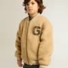 Giacca bomber in pile beige per bambini