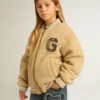 Giacca bomber in pile beige per bambini