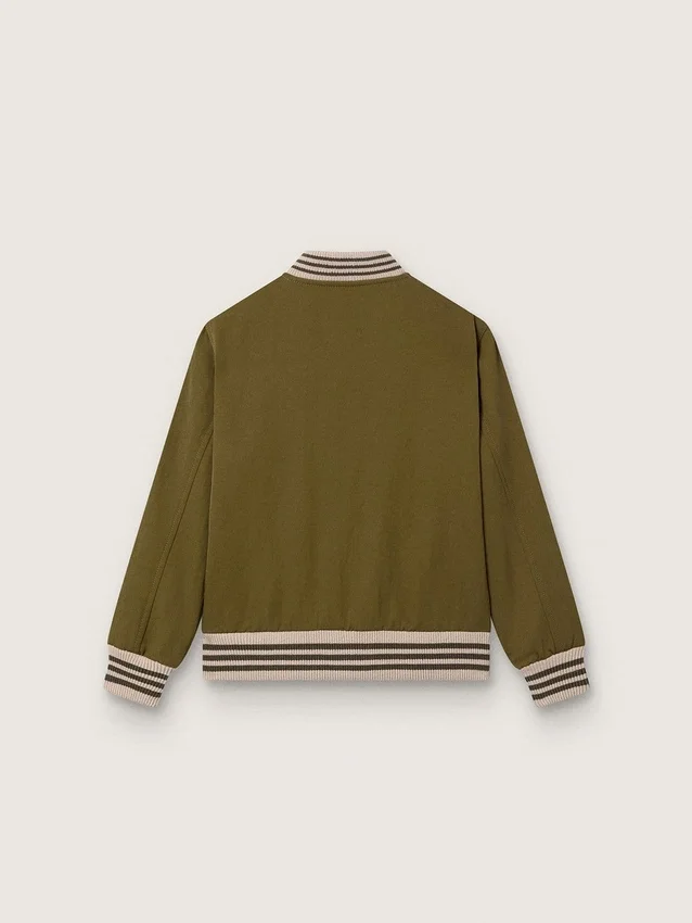Giacca bomber unisex Journey in twill di nylon verde militare con toppa ricamata