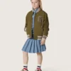 Minigonna a pieghe da bambina “Journey” in chambray di cotone azzurro con logo ricamato