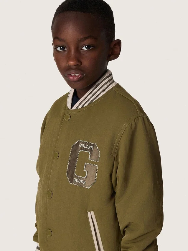 Giacca bomber unisex Journey in twill di nylon verde militare con toppa ricamata