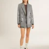 Giacca boyfriend doppiopetto in lana con motivo a micro pied-de-poule e paillettes