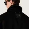 Giacca corta imbottita da uomo in cotone nero con collo in pelle